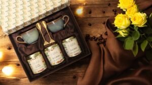 Elegant coffee gift box containing Coffee Nirvana, Palm Sugar, Ceylon Cinnamon, two Ceramic cups and spoon, perfect for gifting, hampers, and celebrations such as Diwali.