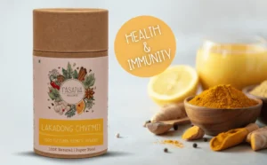 Lakadong Chyrmit in a container, highlighting its distinctive packaging and the aromatic, finely ground spice mix.