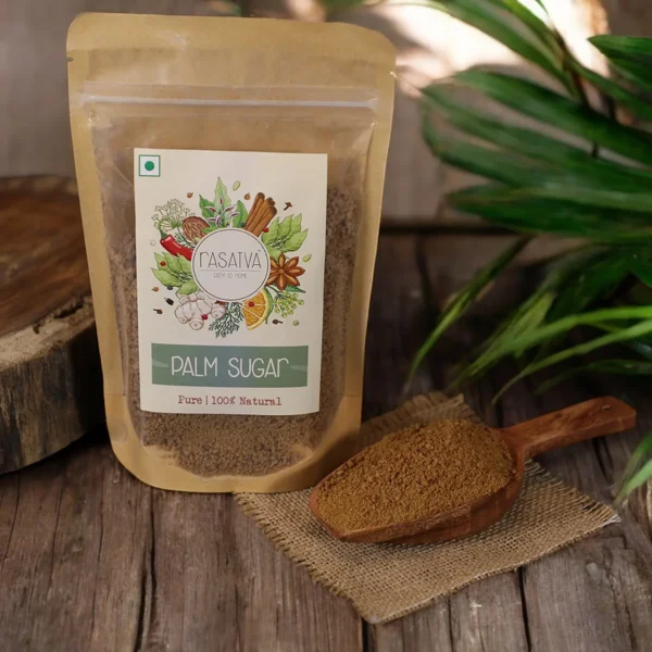 A pack of palm sugar standing on a wooden plateform with a plant in background.