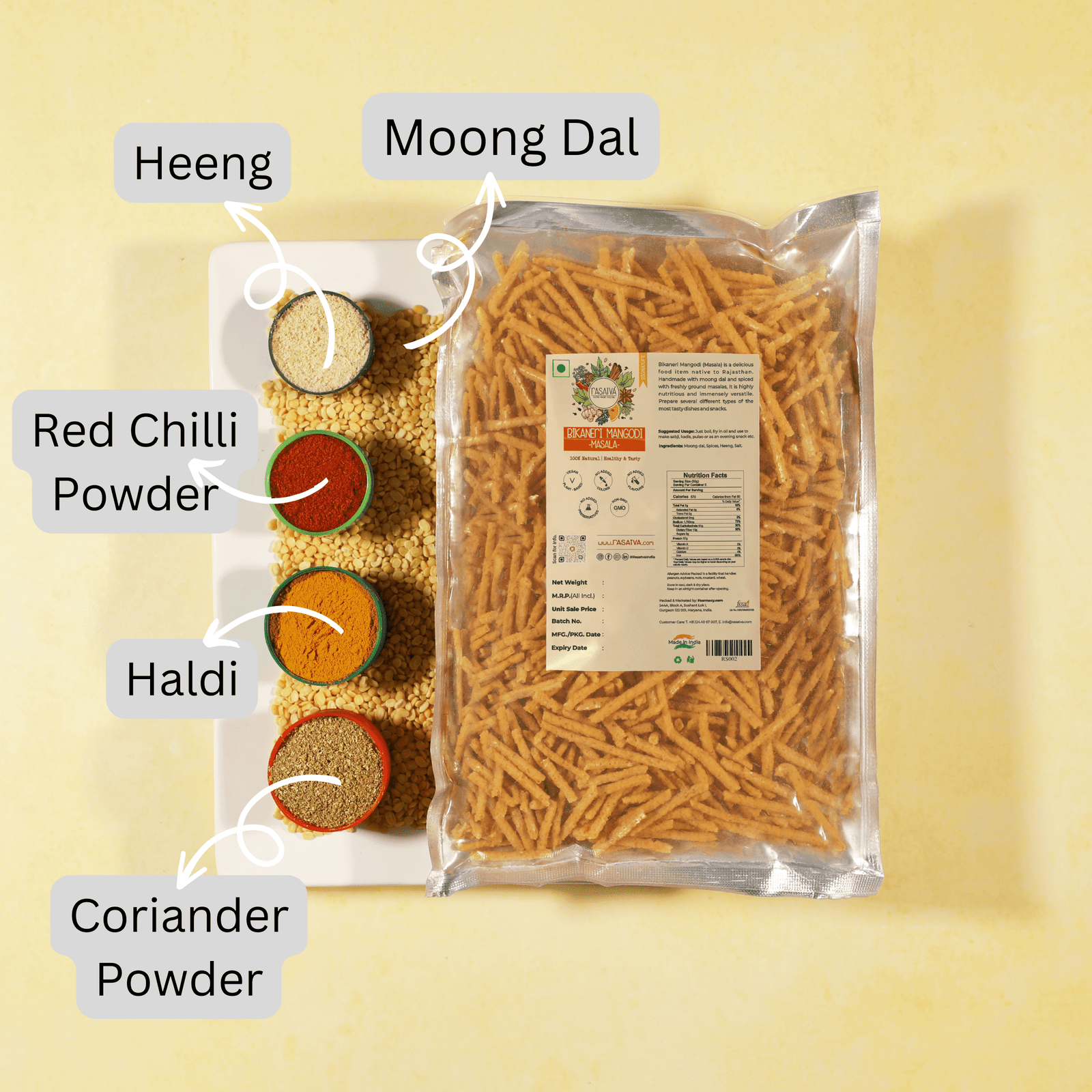 Bikaneri Mangodi Masala packet with red chili, turmeric, hing, coriander, and moong dal displayed, highlighting the seasoning blend and its key spices